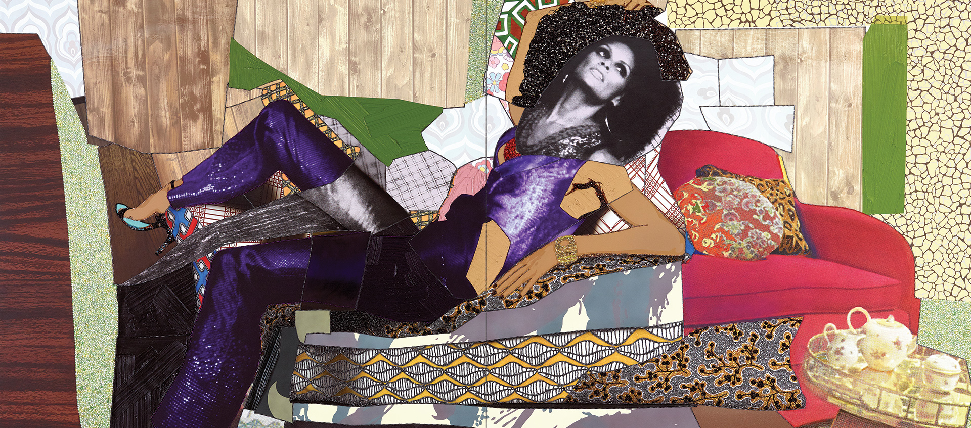 Artist Mickalene Thomas' Painting of a black woman posing on a couch with her foot raised in a collage of colorful materials