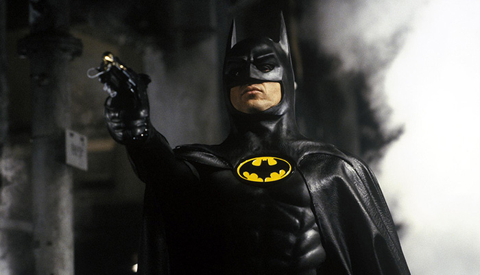 film still of Michael Keaton's Batman/Bruce Wayne in a bat suit