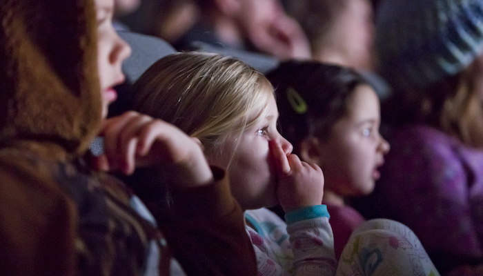 Young children watch a movie in the Wexner Center for the Arts Film/Video Theater during the Zoom: Family Film Festival in December 2017