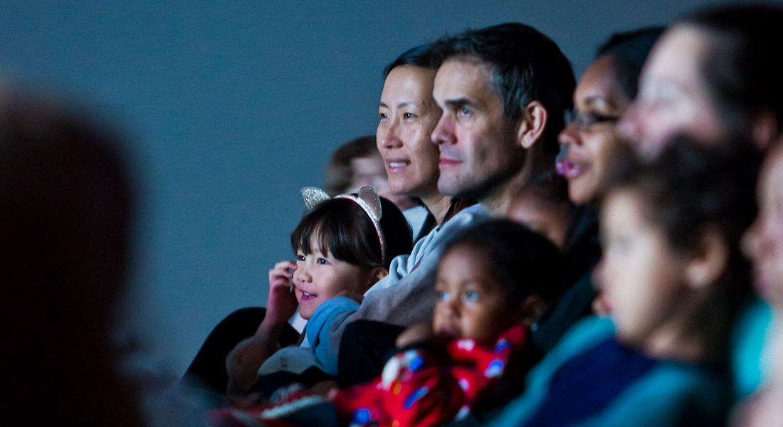 Parents with their children enjoy films at Zoom: Family Film Festival
