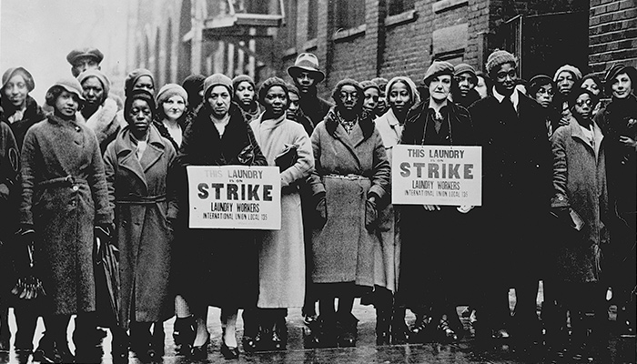 An archival image of striking women laundry workers from the documentary Union Maids