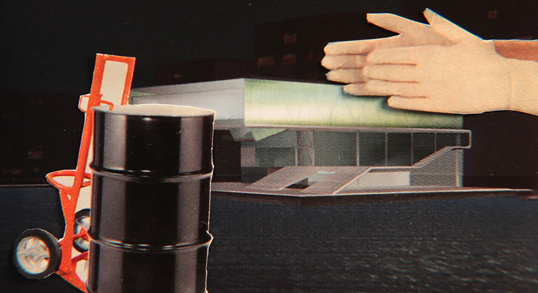  In this color collage, a still from the film, two hands hover over a modernist building while an oil barrel on a cart sits in the foreground.