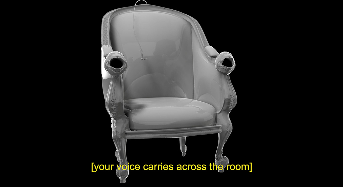 A chair floating atop a black background, a subtitle reads "your voice carries across the room.