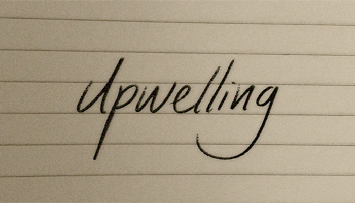 Photo of the word "Upwelling" written on notebook paper