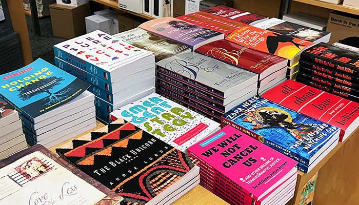 Photo of books on display in the Wexner Center Store that are included in curator jaamil olawale kosoko’s Syllabus for Black Love Library.