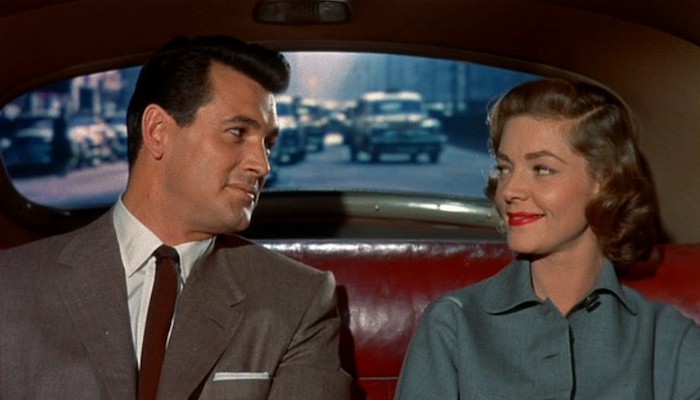 Rock Hudson and Lauren Bacall share a cab ride in a scene from Douglas Sirk's Written on the Wind